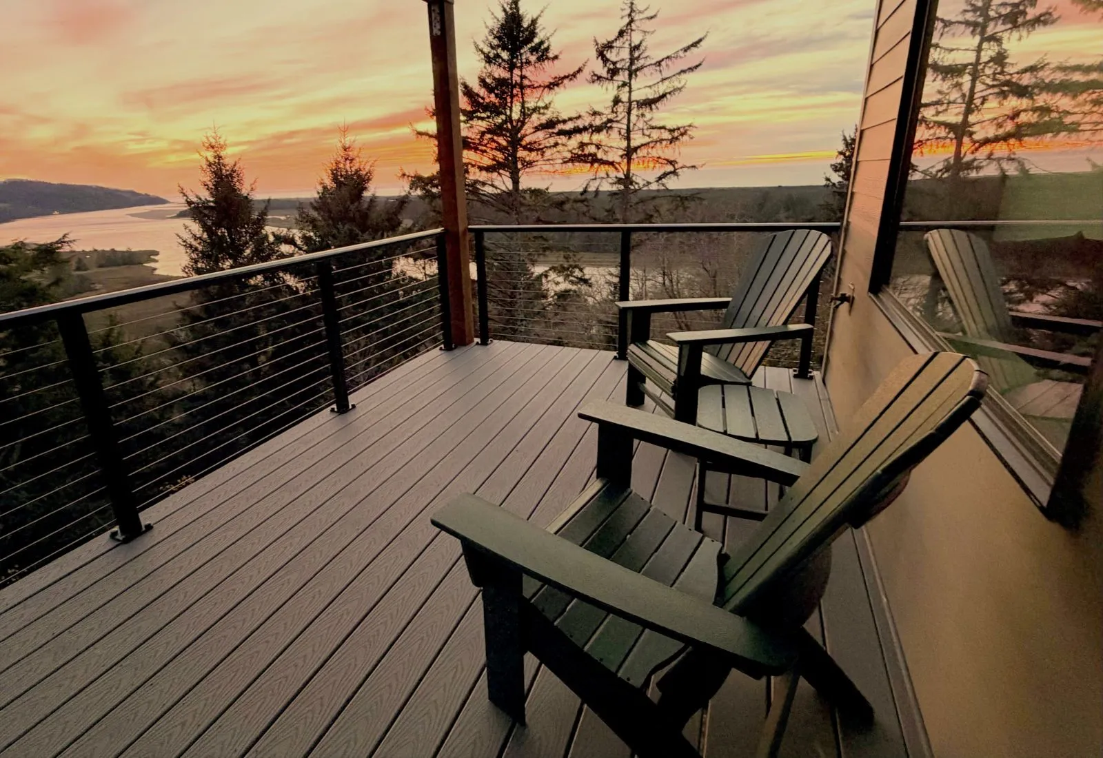 Sunset over the Nestucca Bay National Wildlife Refuge and the Pacific Ocean from the River Ridge Retreat deck
